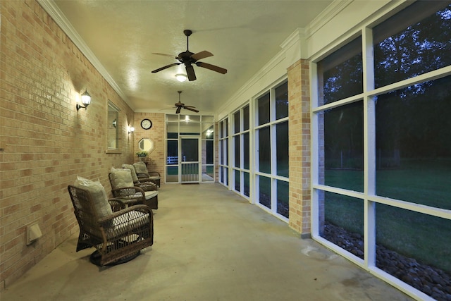 patio at night with ceiling fan