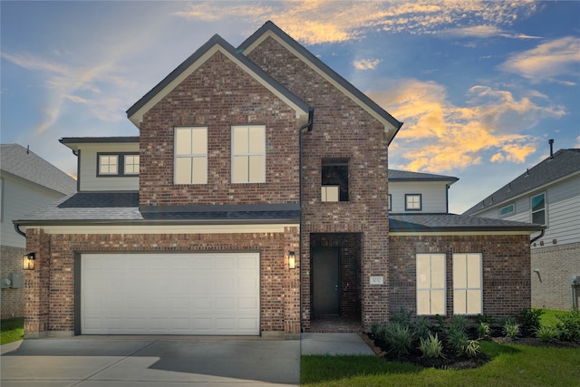 front of property featuring a garage