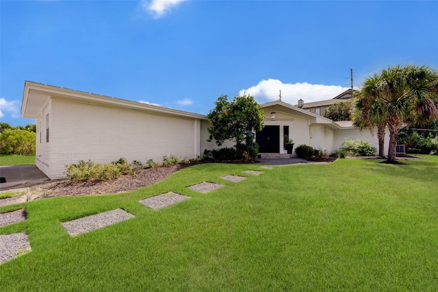 view of front of house with a front yard