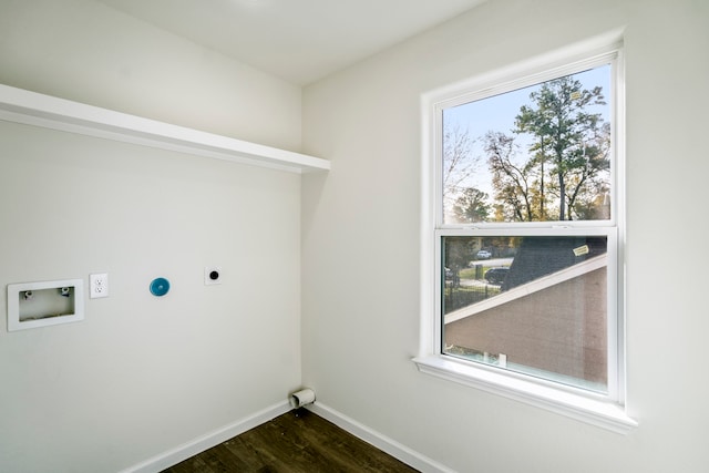 washroom with dark wood-type flooring, hookup for a washing machine, and hookup for an electric dryer