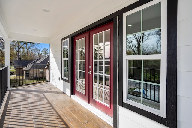 balcony featuring french doors