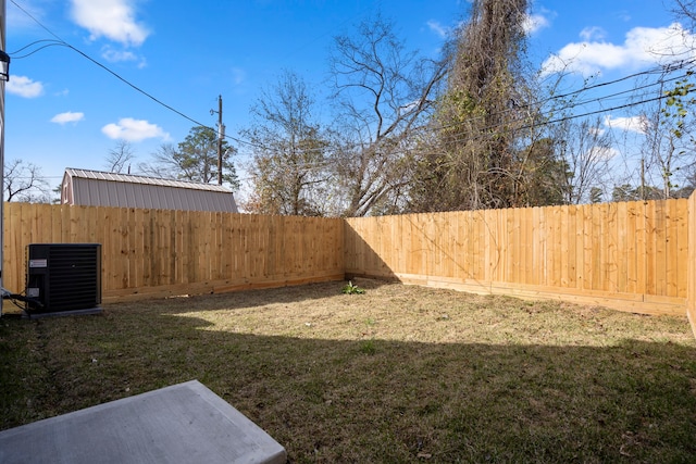 view of yard featuring central AC