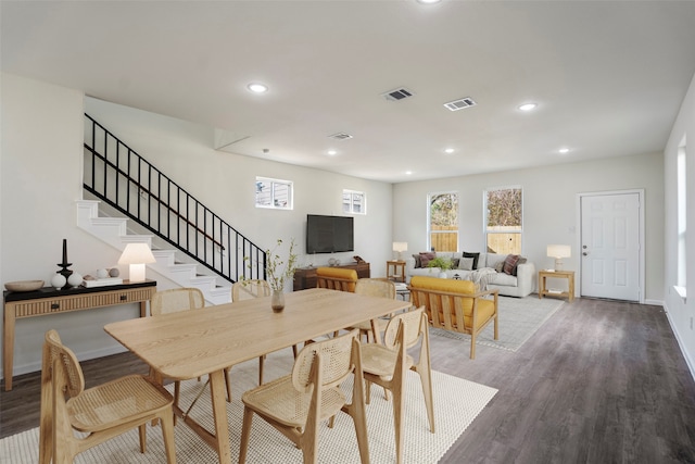 dining area featuring hardwood / wood-style flooring