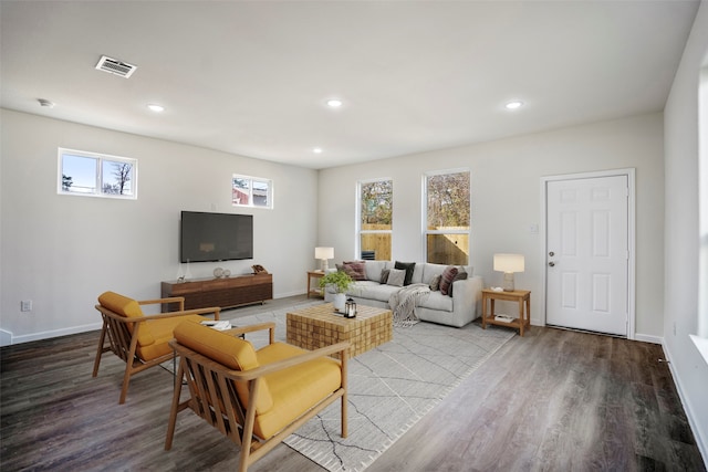 living room with light hardwood / wood-style flooring