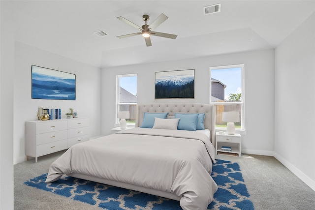 carpeted bedroom with ceiling fan