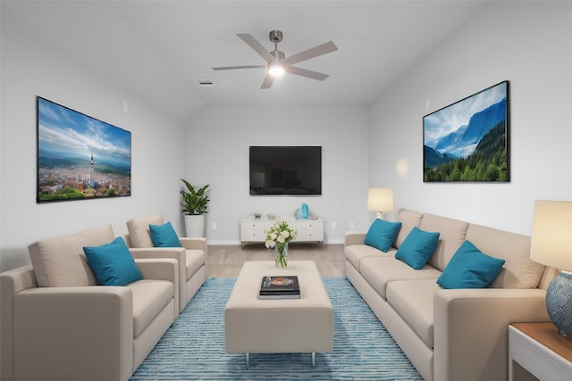 living room featuring carpet floors, ceiling fan, and vaulted ceiling