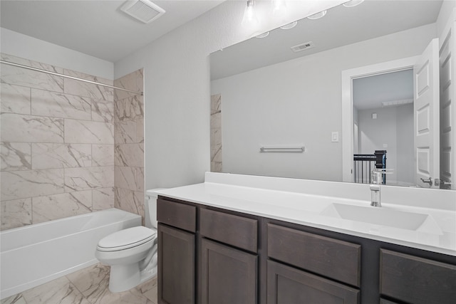 full bathroom with vanity, toilet, and tiled shower / bath combo