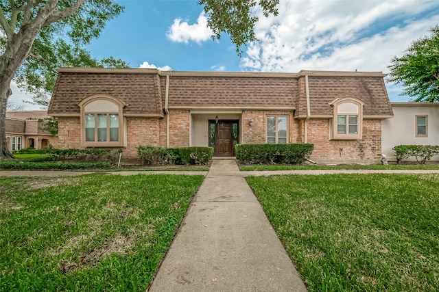 view of front of house with a front yard