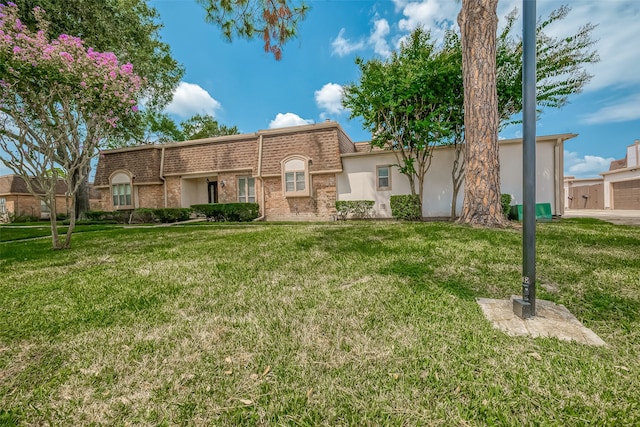 ranch-style house with a front yard