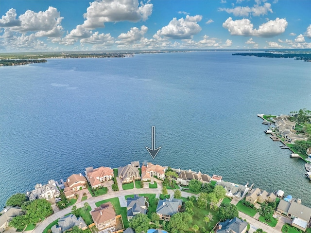 aerial view with a residential view and a water view