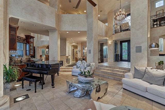 interior space with light tile patterned flooring and an inviting chandelier