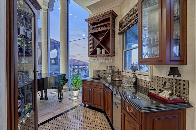 bar featuring ornamental molding and sink