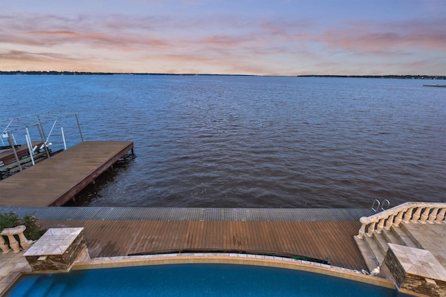 view of dock with a water view