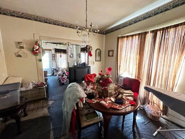 dining space featuring a chandelier