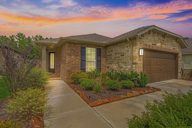 single story home with a garage