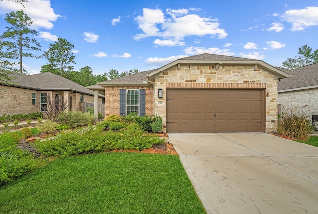 ranch-style house with a garage and a front lawn