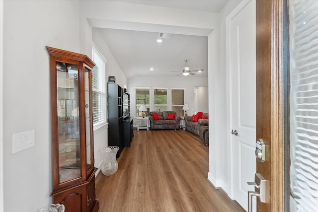 corridor featuring wood-type flooring