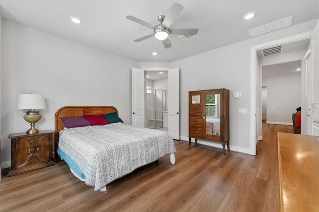 bedroom featuring ceiling fan and wood-type flooring