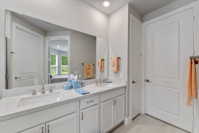 bathroom featuring vanity and tile patterned floors