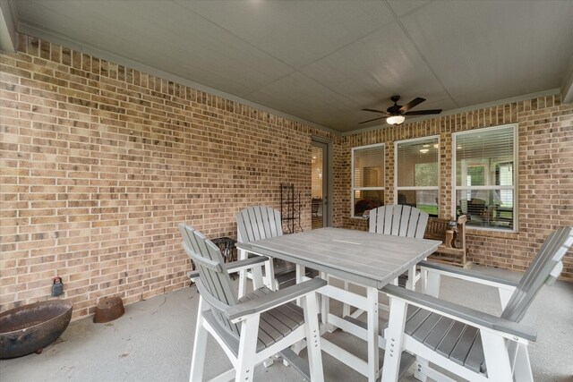 view of patio featuring ceiling fan