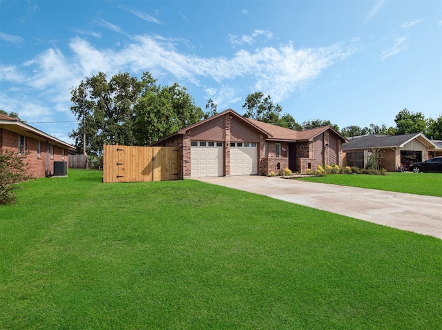 single story home featuring central AC, a front yard, and a garage