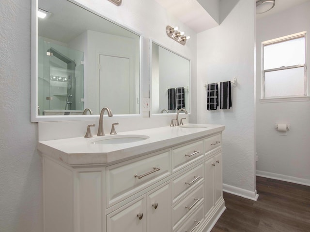 bathroom featuring hardwood / wood-style floors and vanity