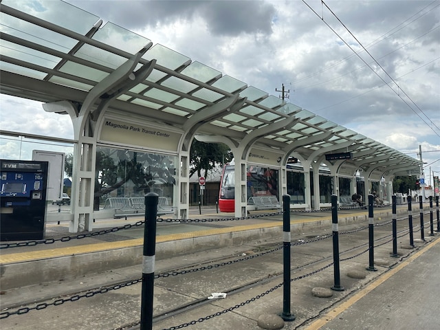 view of vehicle parking featuring a carport