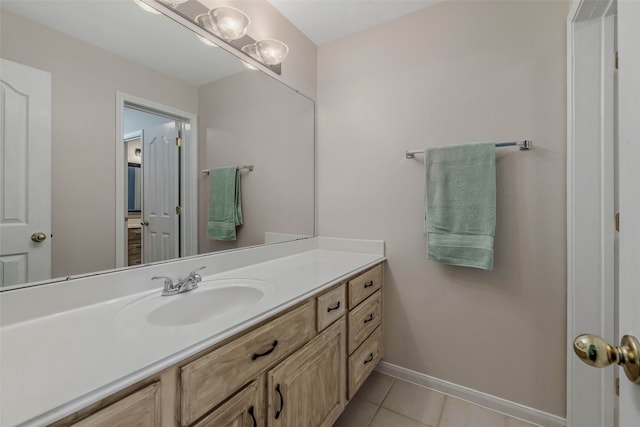 bathroom with tile patterned flooring and vanity