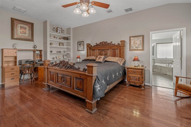 bedroom with ceiling fan, hardwood / wood-style flooring, and connected bathroom