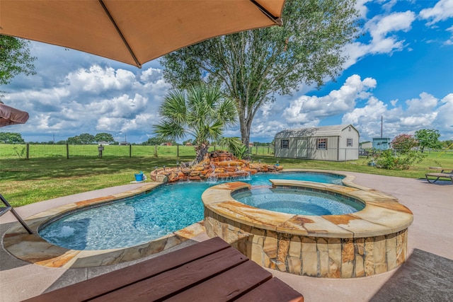 view of swimming pool featuring an in ground hot tub, an outdoor structure, a rural view, and a yard