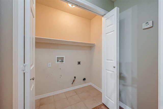 laundry room featuring hookup for a washing machine, hookup for a gas dryer, hookup for an electric dryer, laundry area, and baseboards