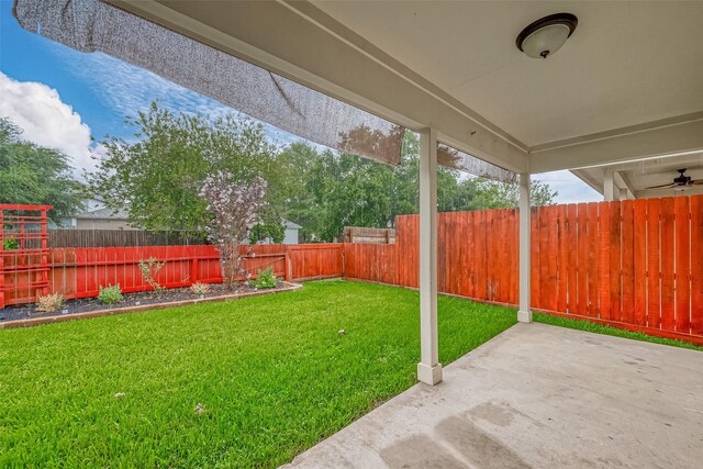 view of yard featuring a patio area and a fenced backyard