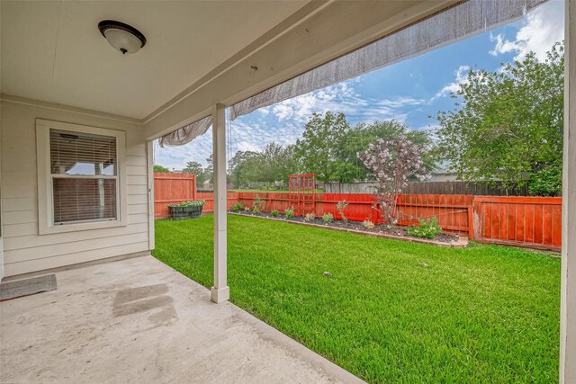 view of yard with a fenced backyard and a patio