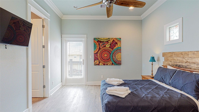 bedroom with ceiling fan, light hardwood / wood-style flooring, and ornamental molding