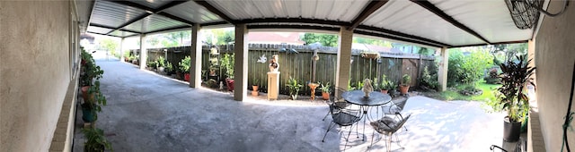 unfurnished sunroom with lofted ceiling