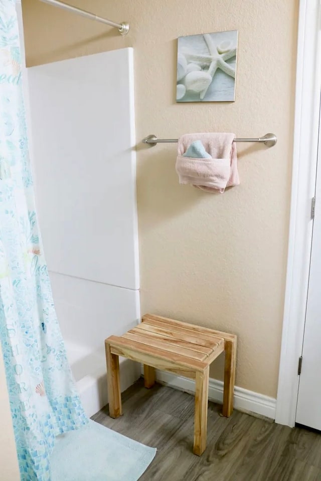 mudroom with hardwood / wood-style flooring