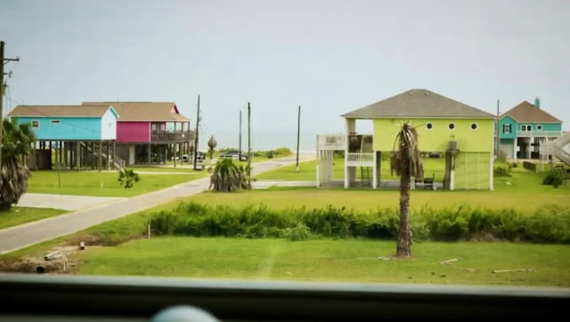 view of community featuring a lawn