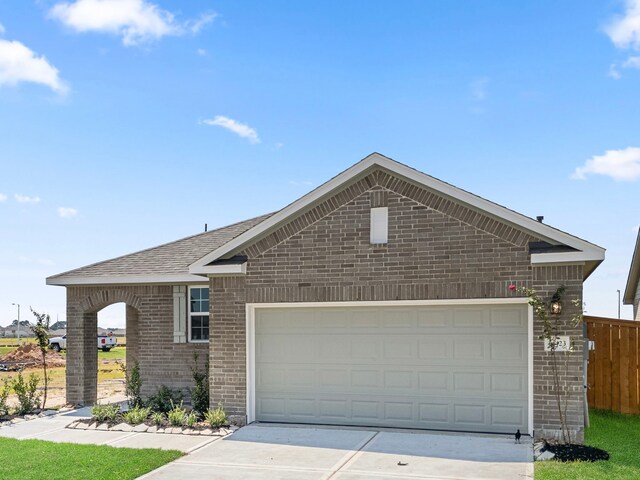 view of side of home featuring a garage