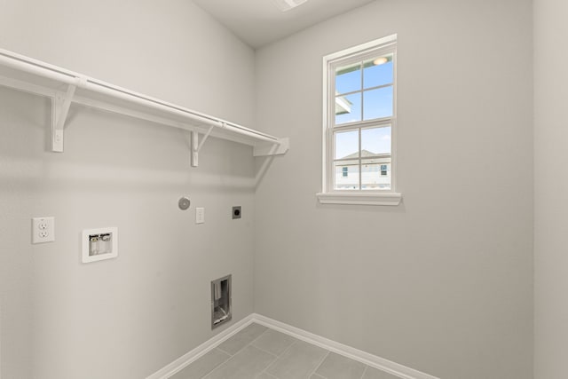 laundry room featuring hookup for a washing machine, electric dryer hookup, and tile patterned floors