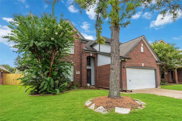 view of front of house featuring a front lawn and a garage