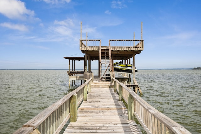 dock area featuring a water view