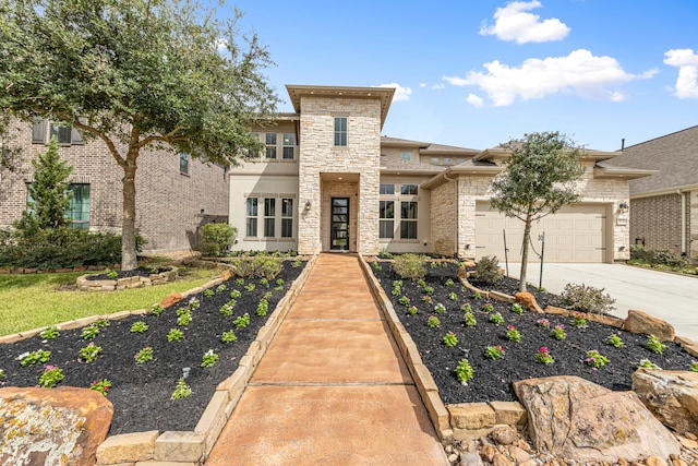 view of front of property with a garage