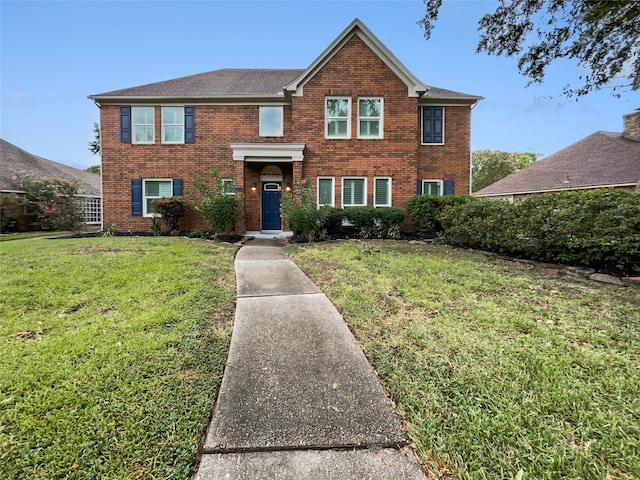 view of front of home featuring a front yard