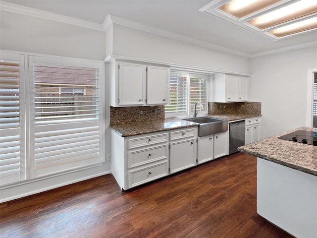 kitchen with stainless steel dishwasher, white cabinets, dark wood-type flooring, and sink