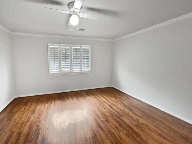 spare room featuring crown molding, ceiling fan, and hardwood / wood-style flooring