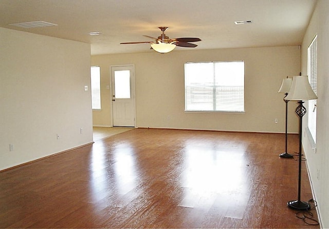 interior space with light wood-type flooring and ceiling fan