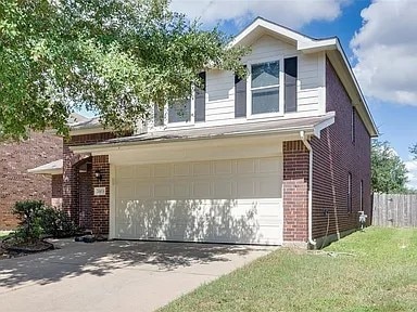 view of property exterior featuring a garage