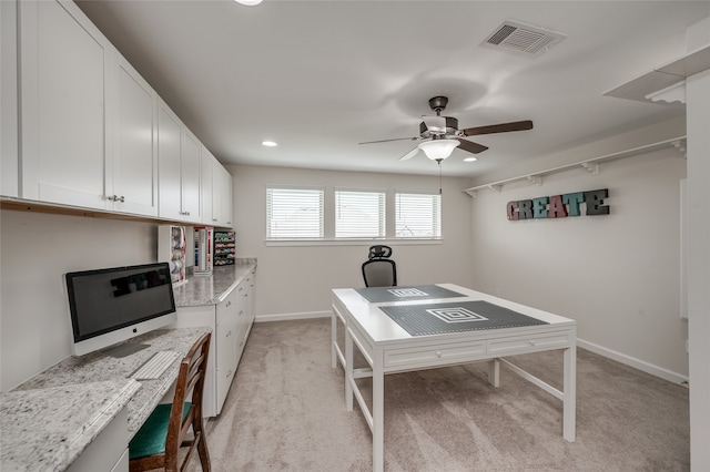 office area with light colored carpet and ceiling fan