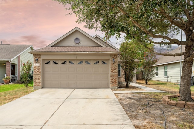 view of front of home featuring a garage