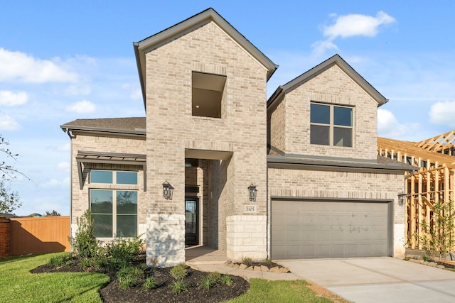 view of front of property featuring a garage